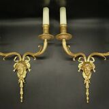 Pair of large Louis XVI style sconces with male faces - bronze
