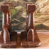 Pair of Art Deco carved wood candlesticks, signed Delaporte
