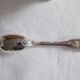 Cockerel + silver metal spoon