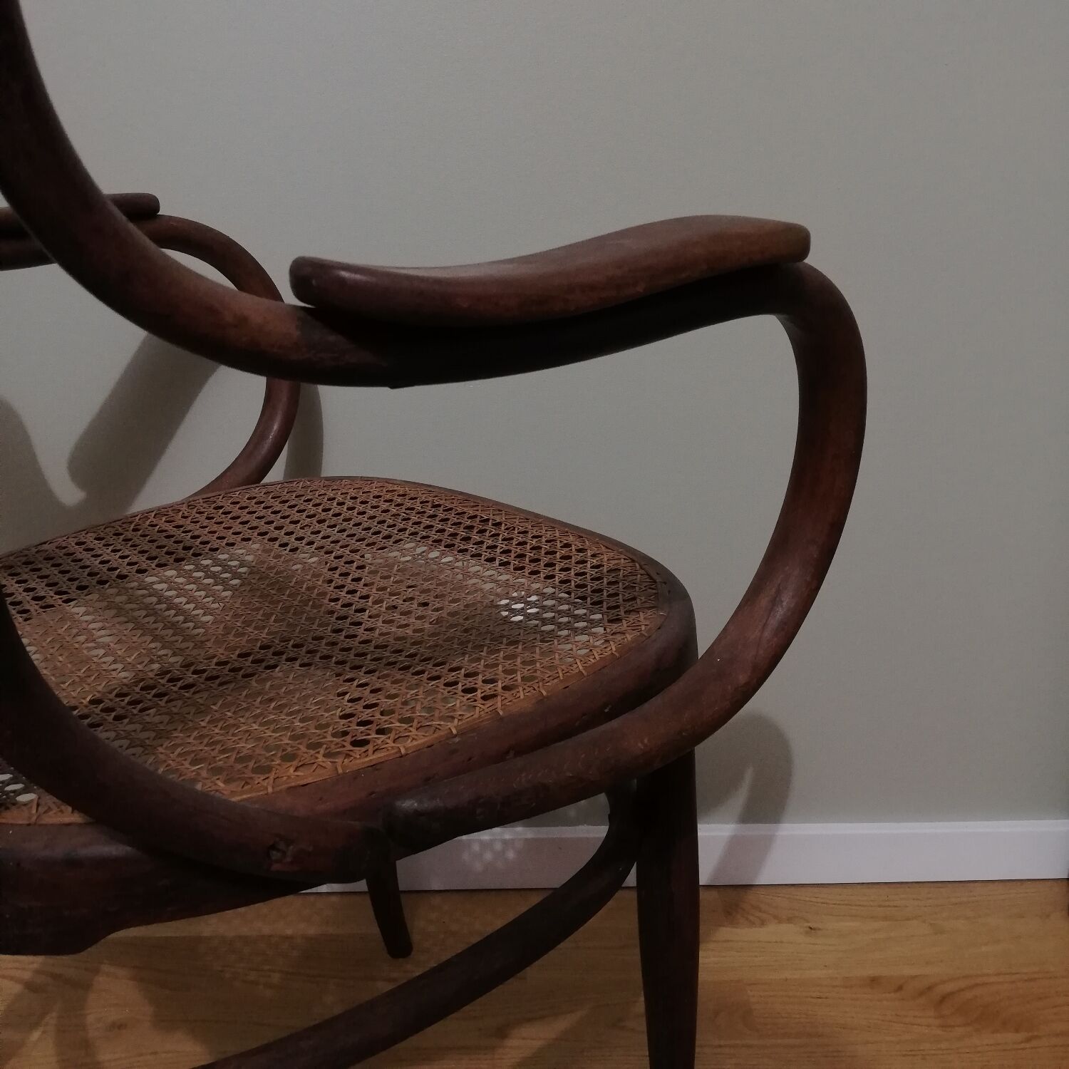 Canned armchair in curved wood signed J.Kohn