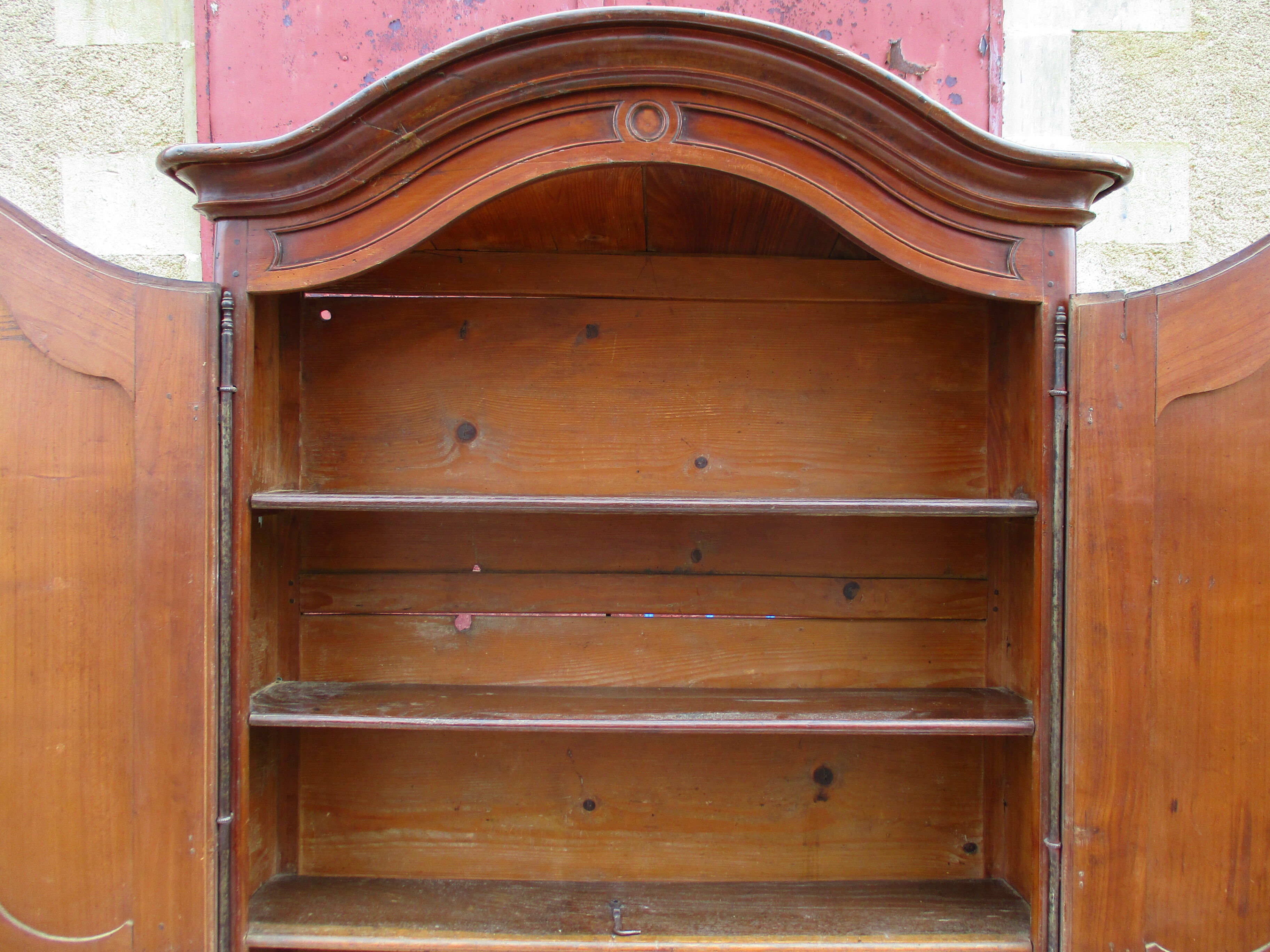 Small solid wooden cabinet with a gendarme hat
