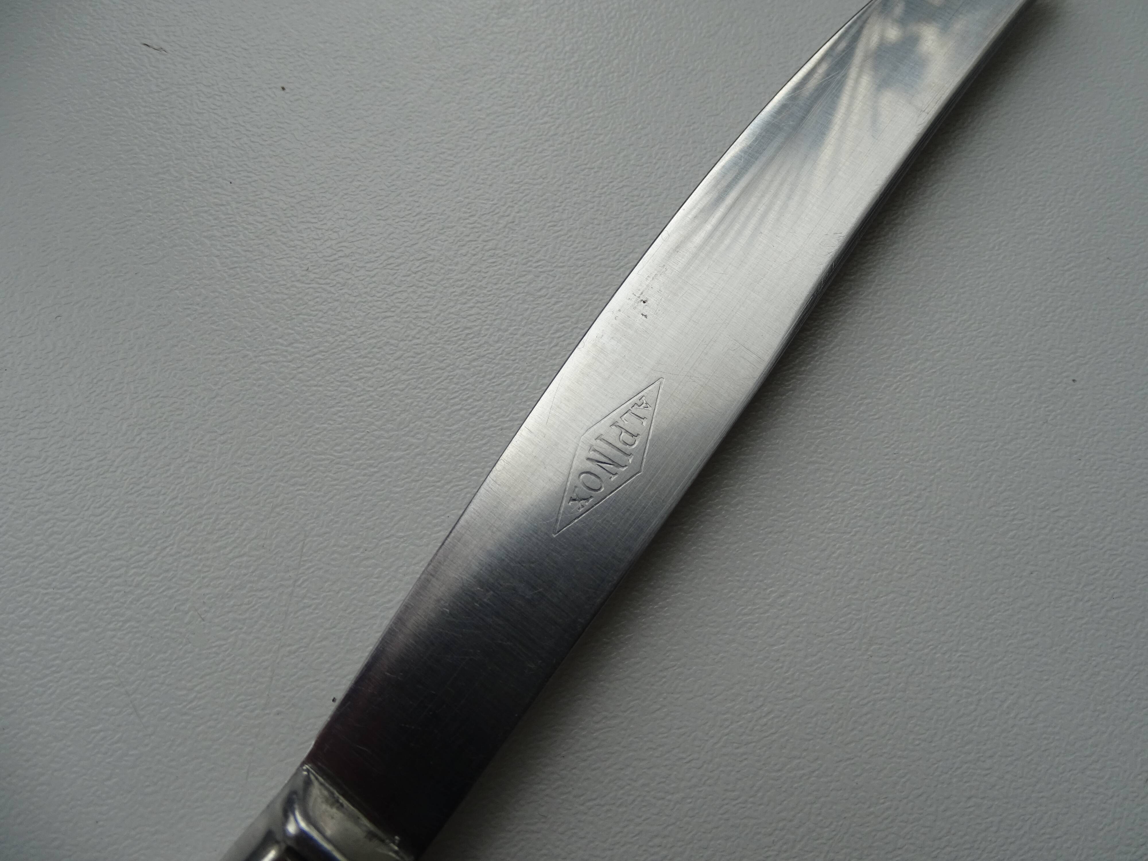 12 vintage Alpinox knives