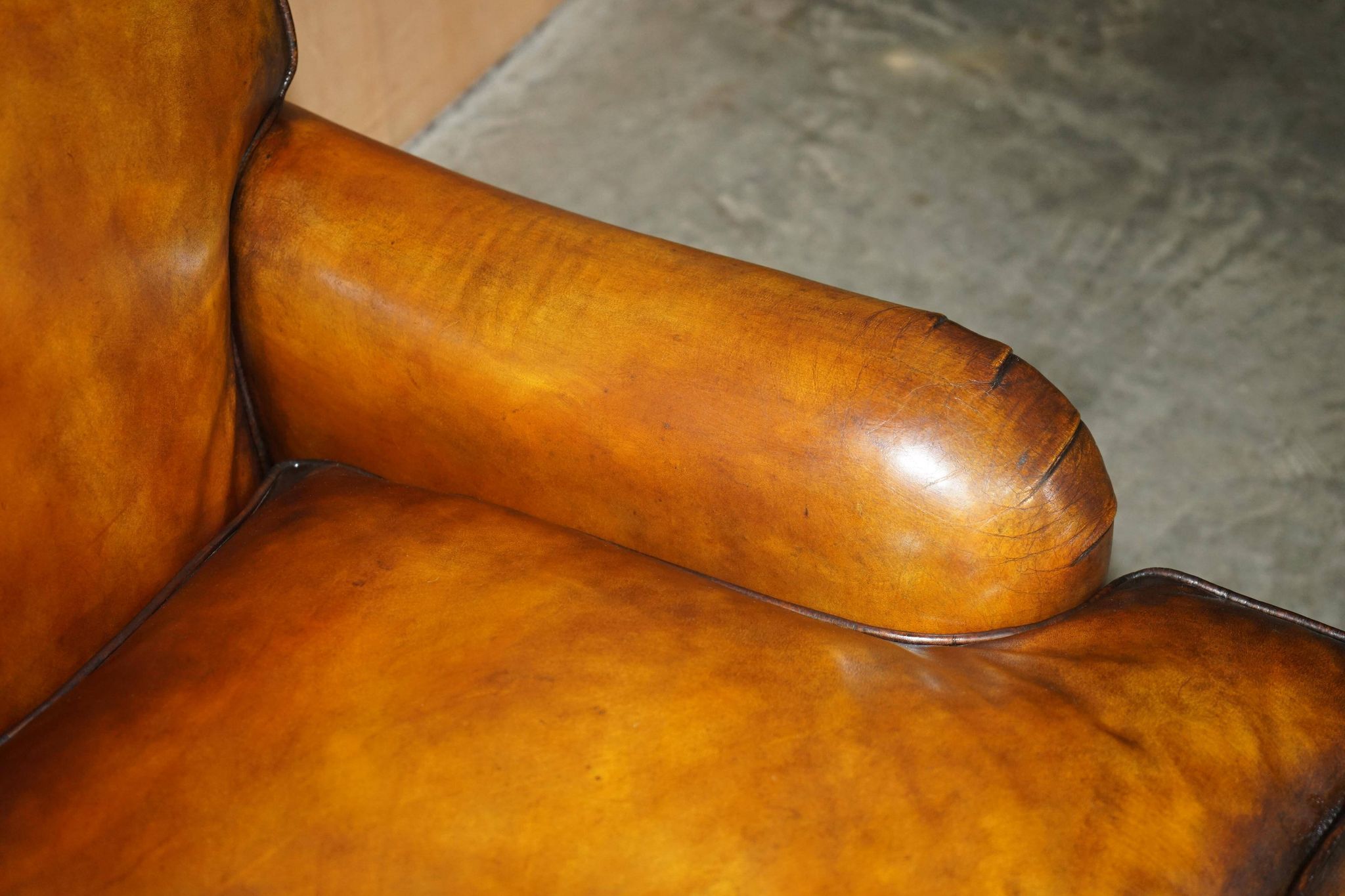 Howard & Son restored leather canapé, width 145 cm