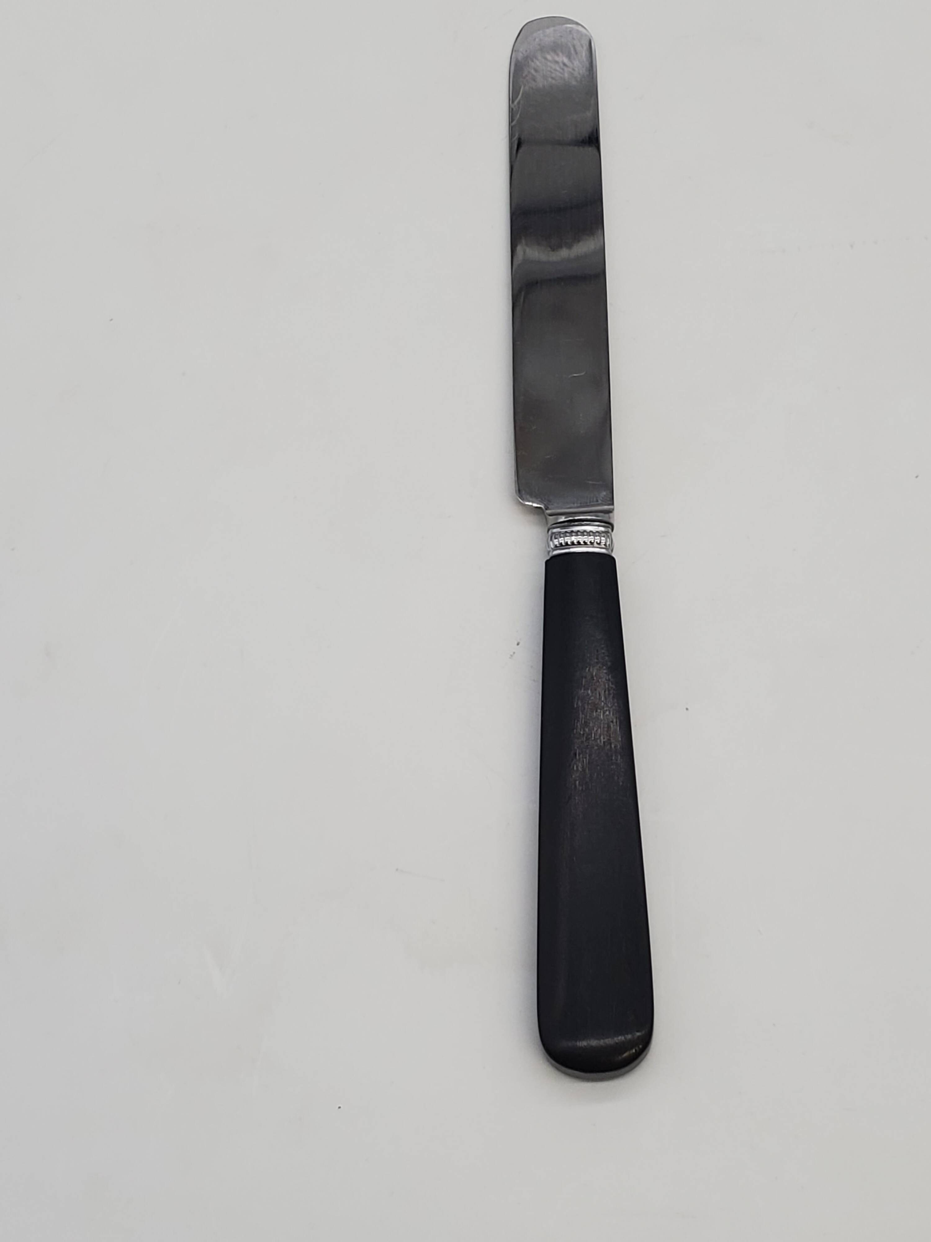 Set of 6 round-tipped dessert knives with dark wood, Nilox blade.