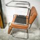 Pair of cantilever chrome and skaï chairs