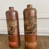 Duo of bottles in ancient sandstone