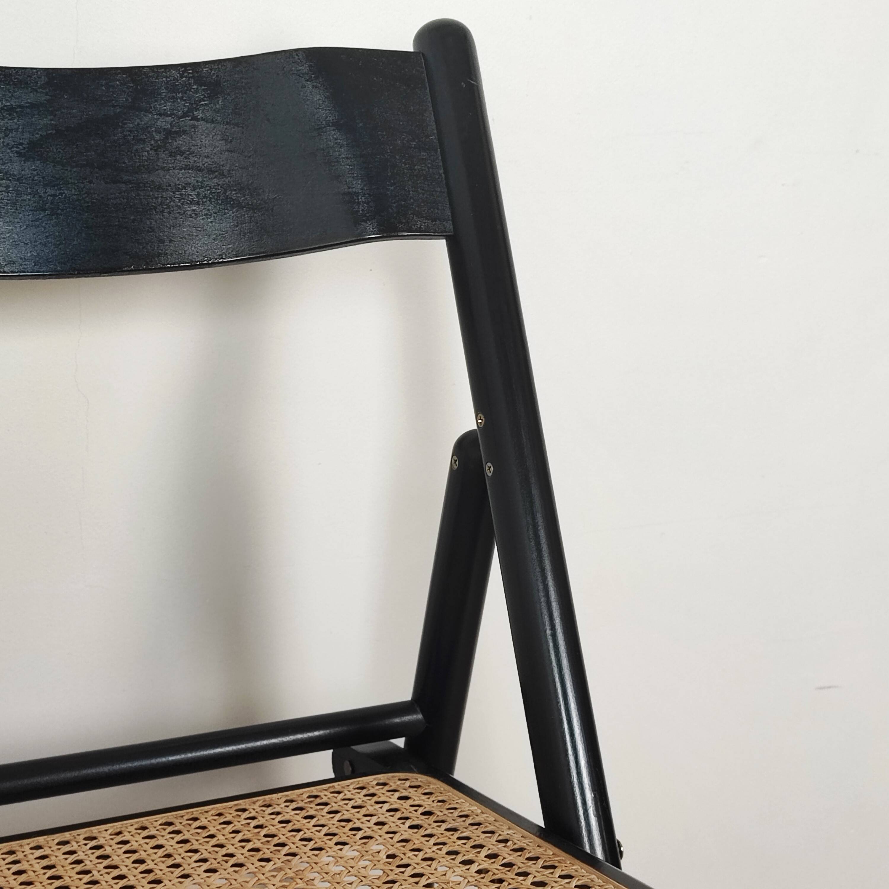 Pair of wooden and rattan folding chairs