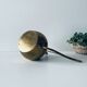 Old brass watering can