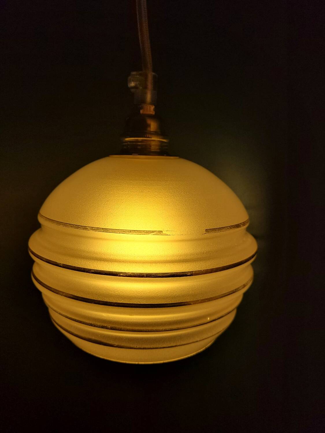 Frosted glass lamp with golden trims