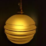 Frosted glass lamp with golden trims