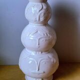 Totem vase faces in ceramic