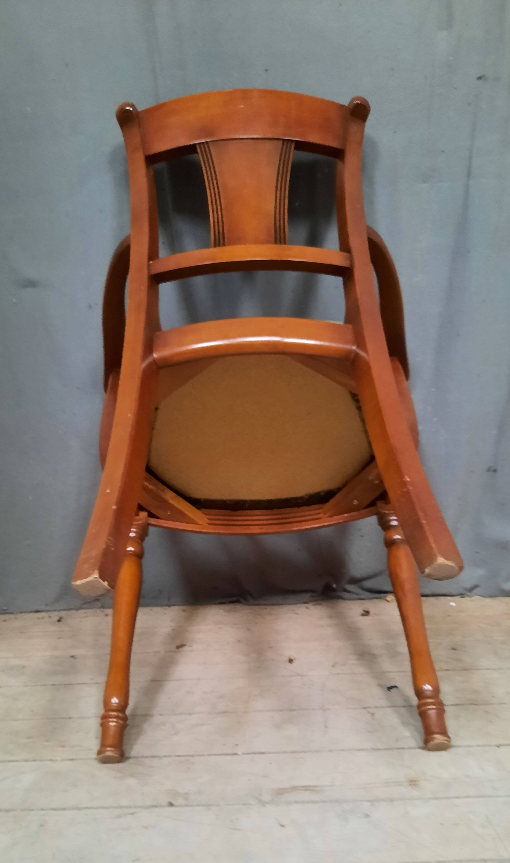 Modern armchair in varnished wood