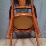 Modern armchair in varnished wood