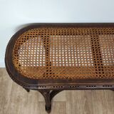 Caned piano bench