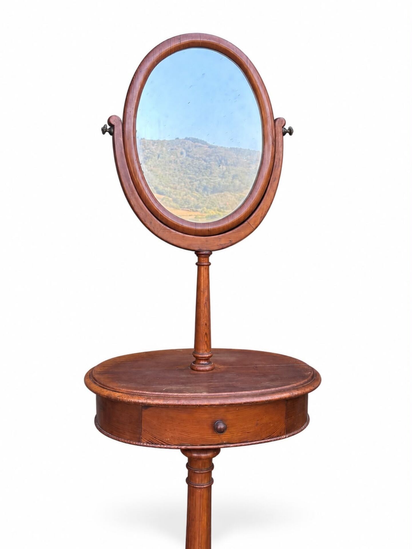 Barber's or shaving mirror on a Victorian stand. 19th century.