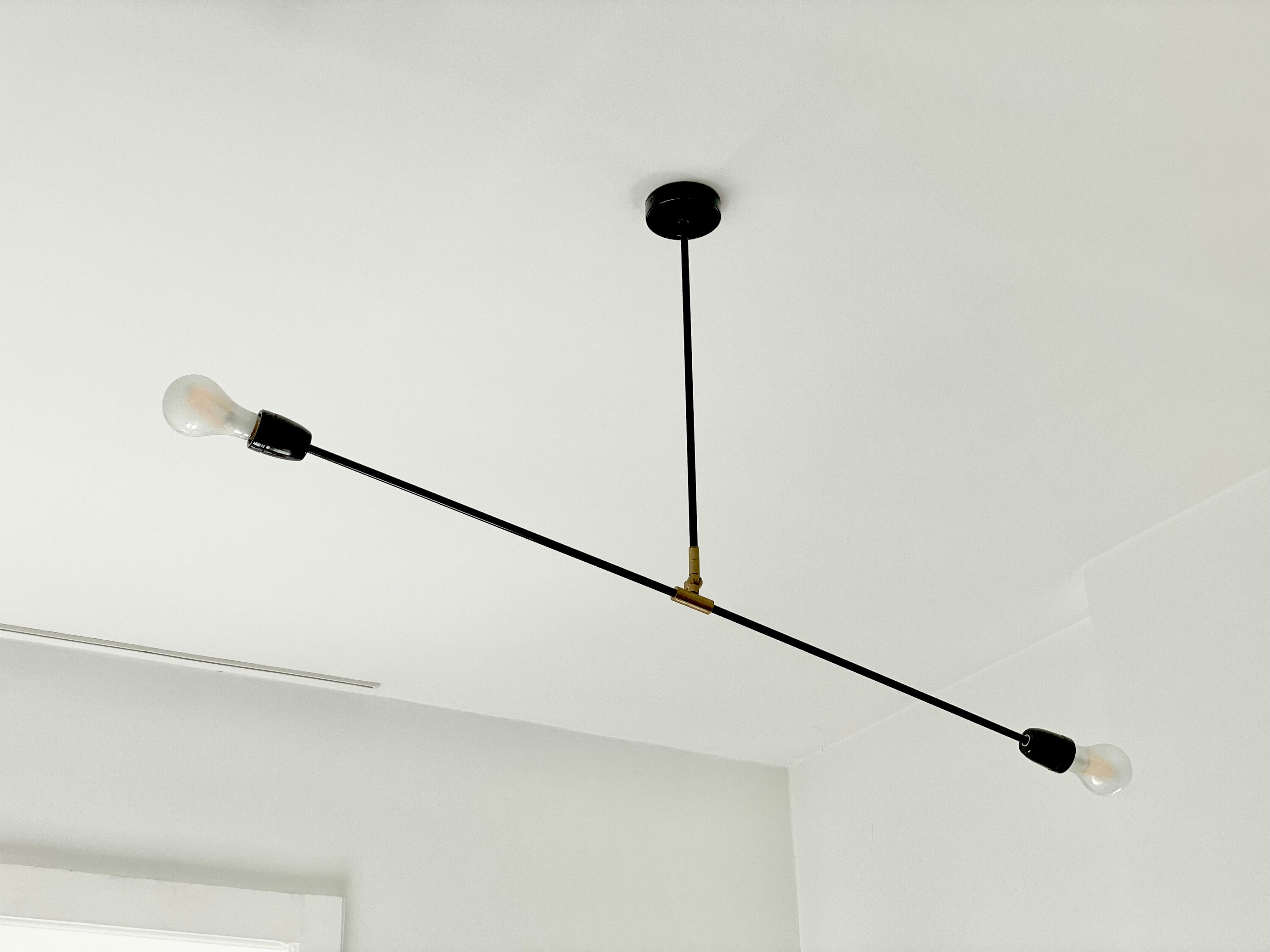 Porcelain lamp and articulable metal