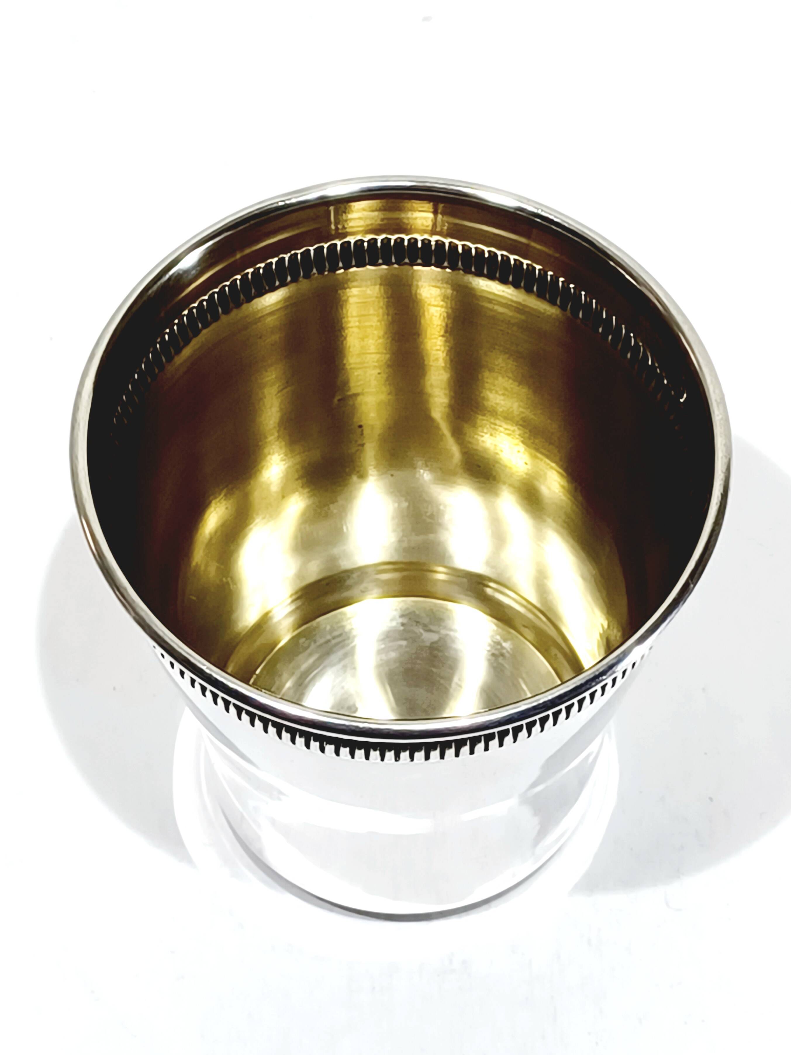 Solid silver cup with gadroon motif