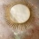 Vintage gold metal sun mirror