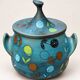 Vintage ceramic soup tureen with floral decoration.
