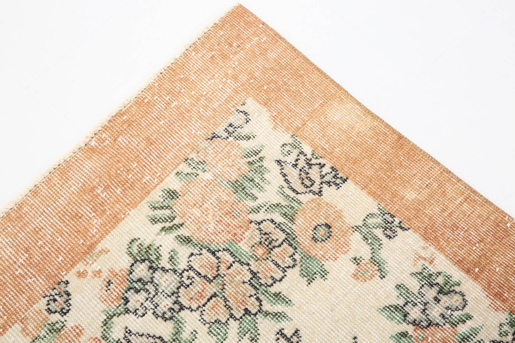 Tapis en laine et coton à décor floral