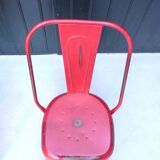 Pair of red stackable metal chairs