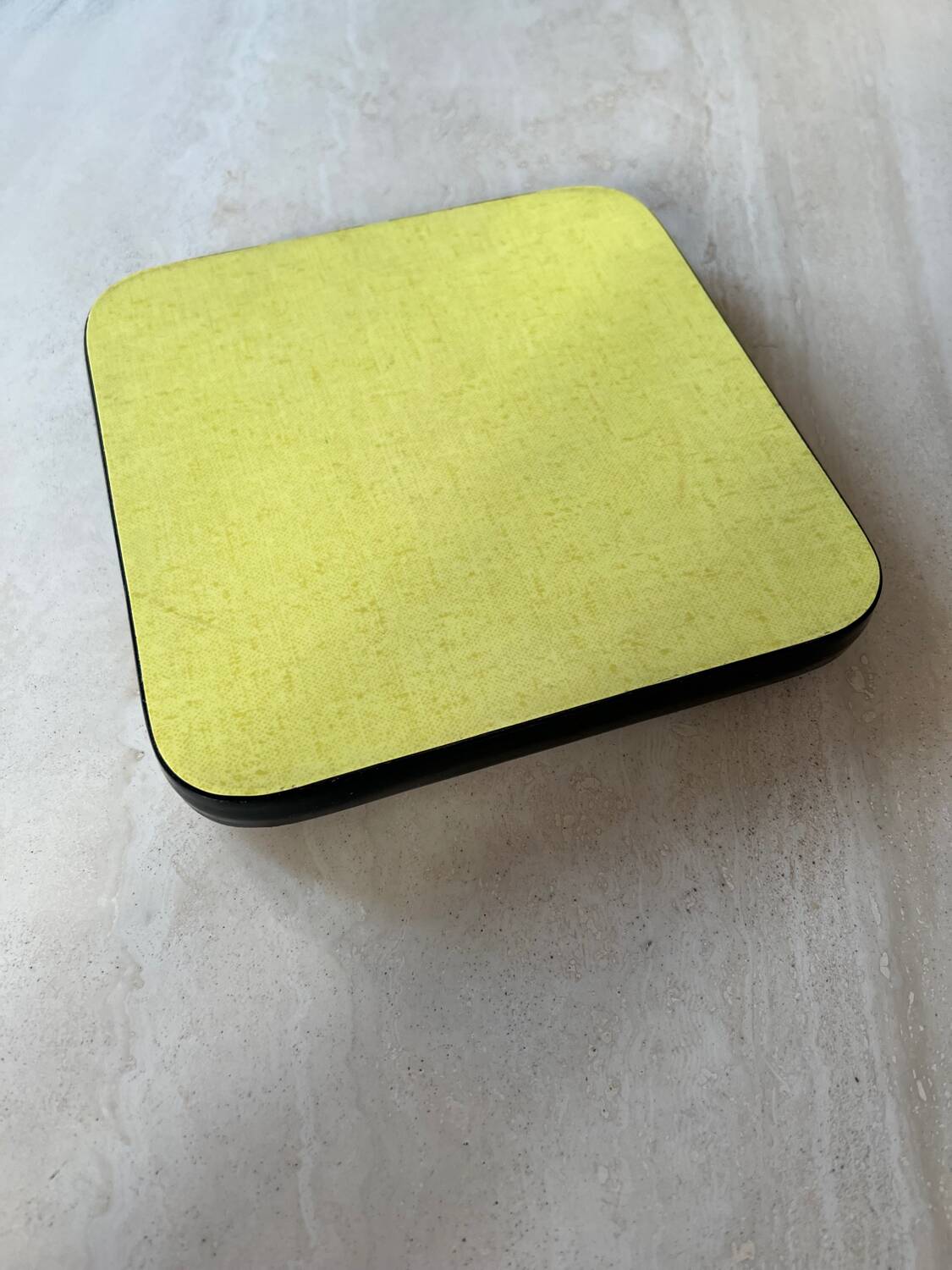 Yellow Formica trivet