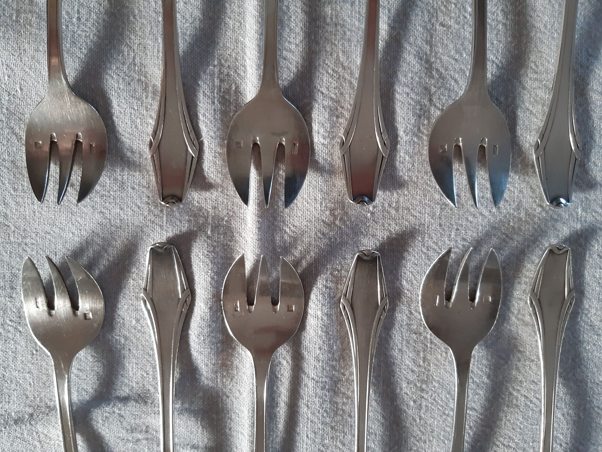 12 fourchettes à huitres métal argenté  art deco ravinet d'enfert