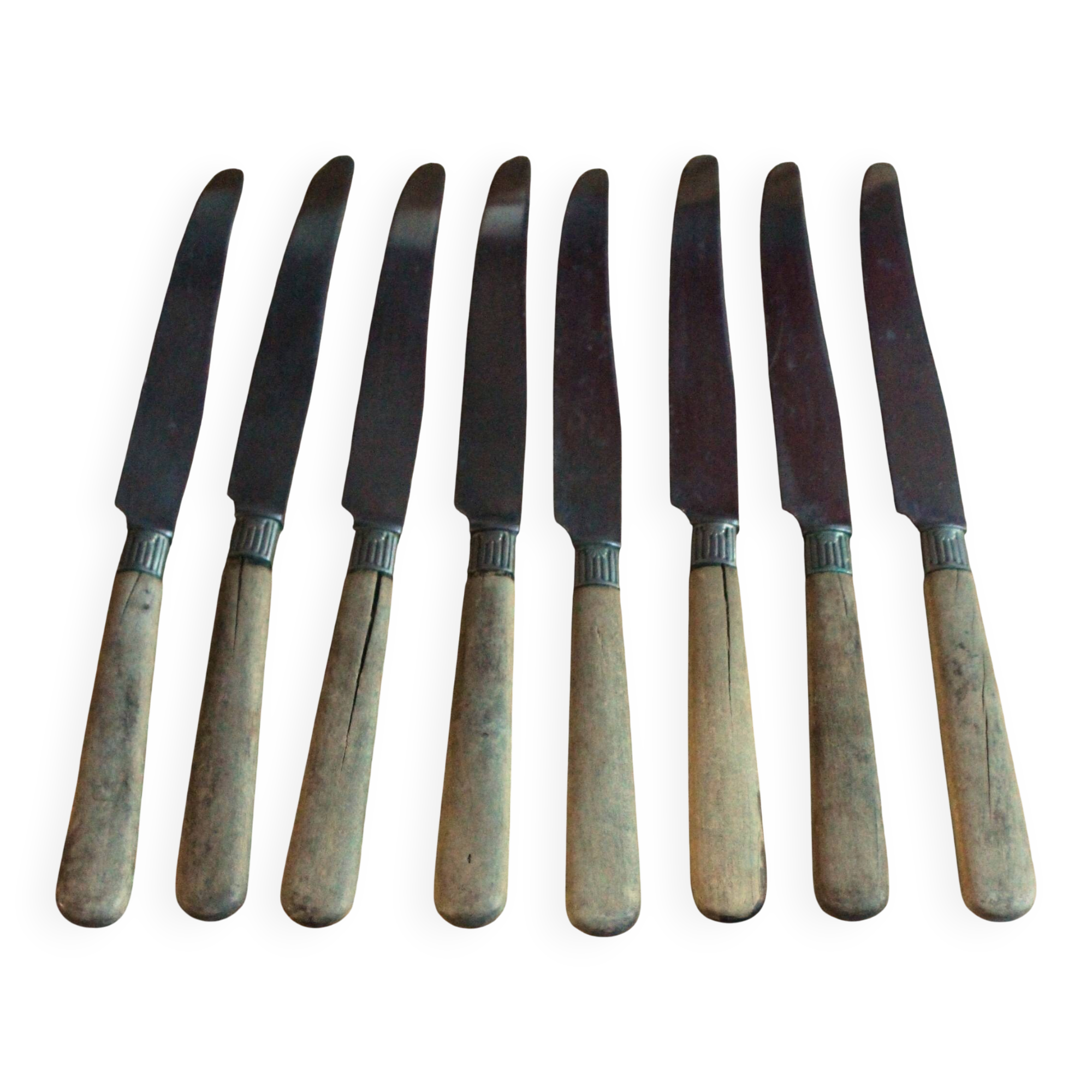 Lot of 8 antique knives with wooden handles.