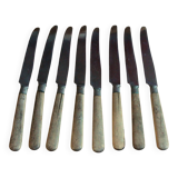 Lot of 8 antique knives with wooden handles.