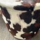 Pouf coffre en peau de vache des années 70