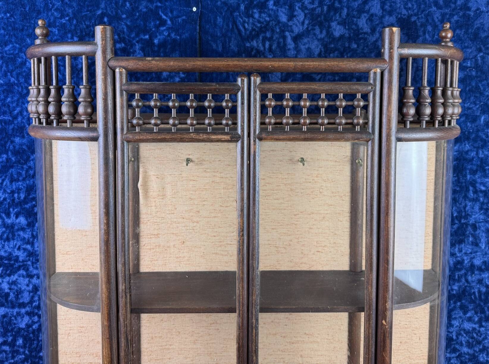 Asia 19th century: Magnificent collector's display case with tapestry background