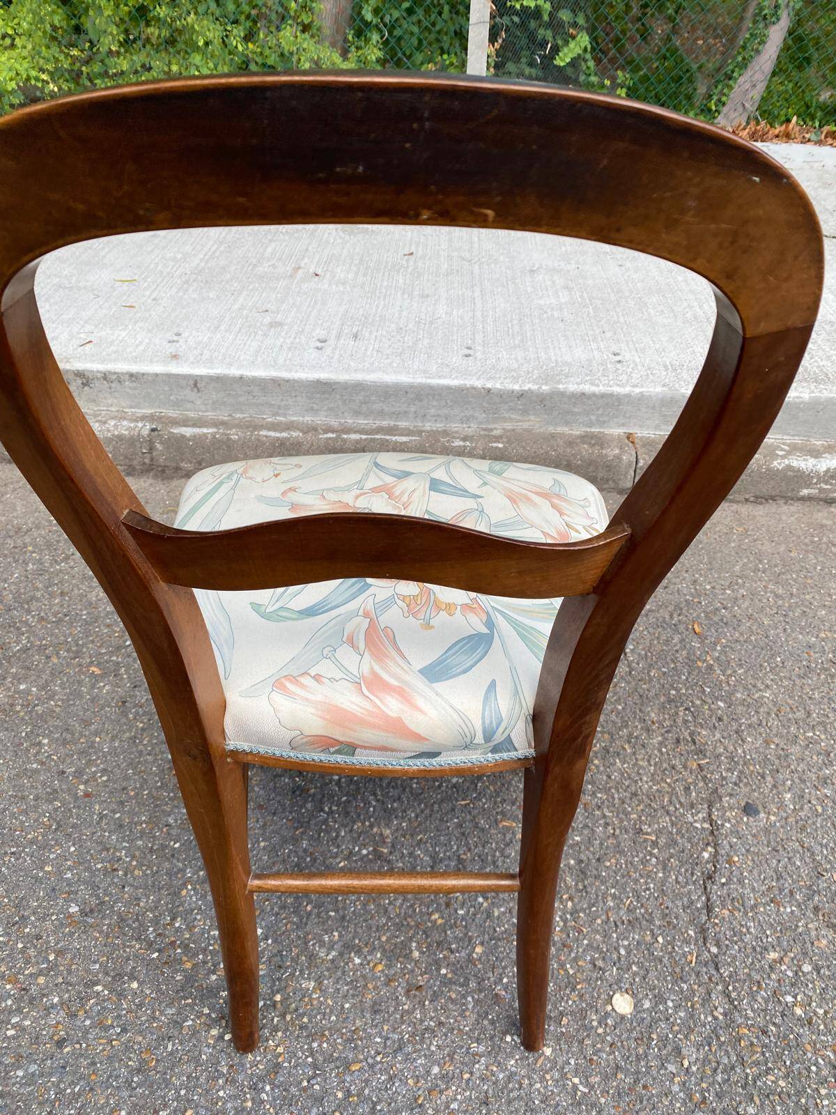 Antique flying chair in Restoration / Louis-Philippe style made of solid wood.