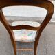 Antique flying chair in Restoration / Louis-Philippe style made of solid wood.