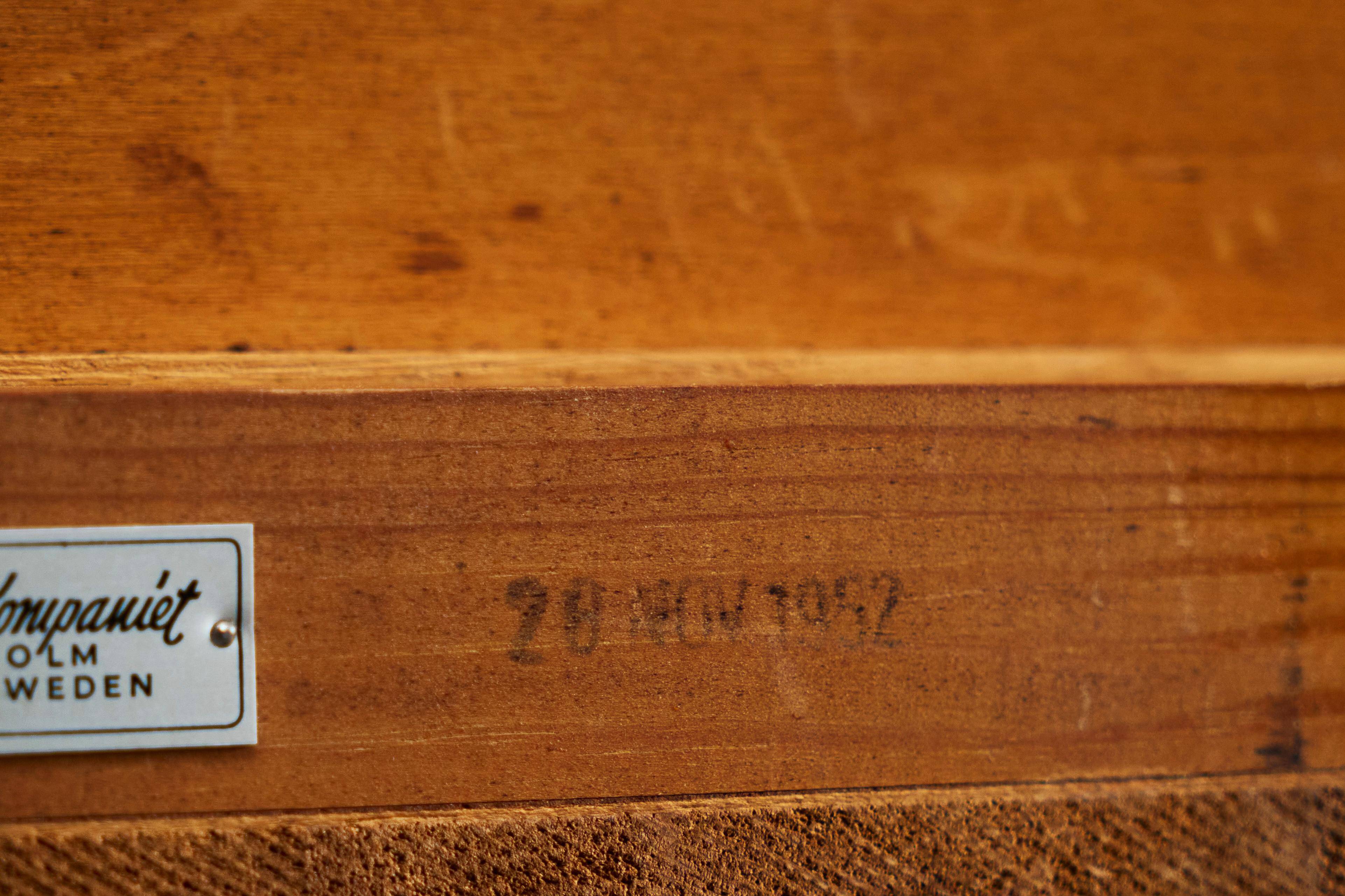 Pair of bedside tables by Nordiska Kompaniet in teak, 1952, by David Rosén.