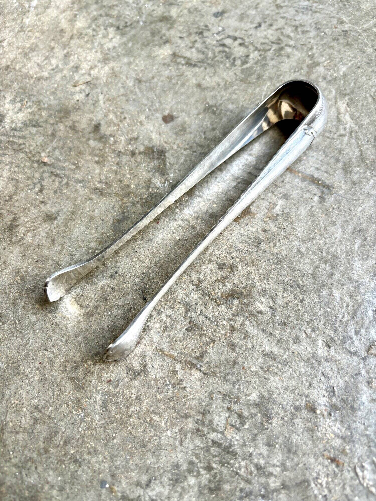 Christofle sugar tongs in silver metal