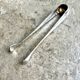 Christofle sugar tongs in silver metal