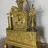 Period clock restoration in gilded bronze