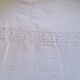 Drap de lin en broderie richelieu monogrammé ab