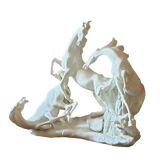 White statue Cavalho" 3 white wild horses