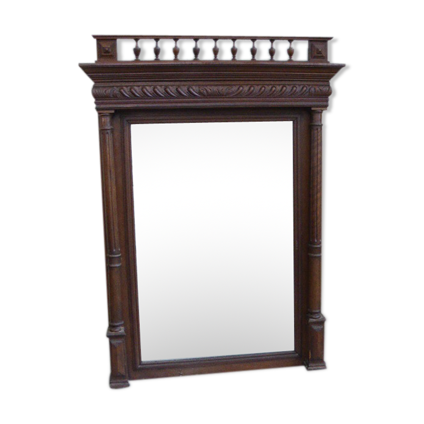 Large mirror beveled Henri II style varnished and carved wooden 128 x 92 cm