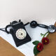 Old phone in black Bakelite