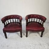 Pair of barrel chairs in turned wood and burgundy leather – Productio