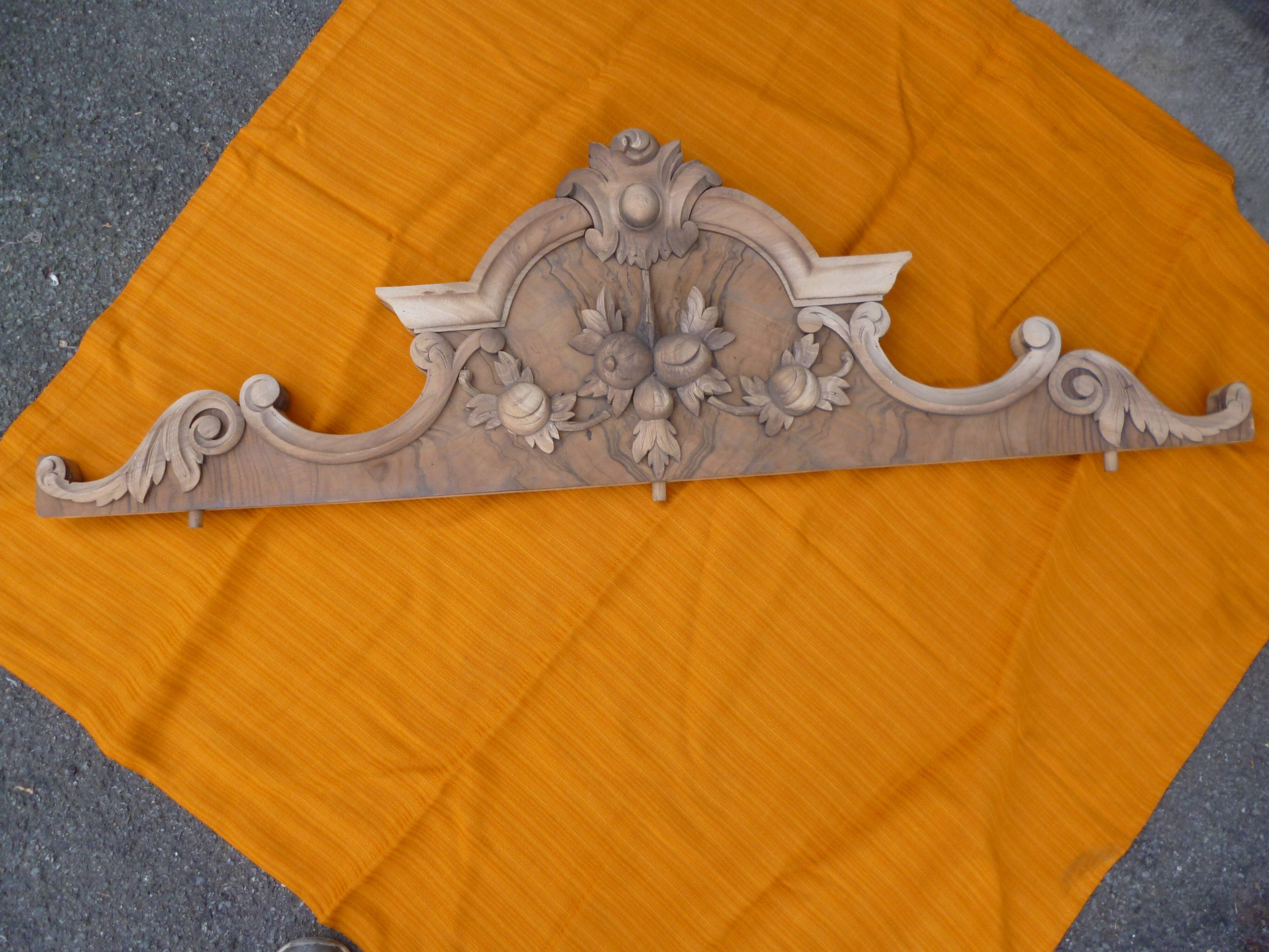 Carved wooden pediment