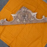 Carved wooden pediment