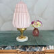 Art Deco lamp with pastel pink opaline globe.