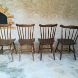 Eight mismatched bistro chairs