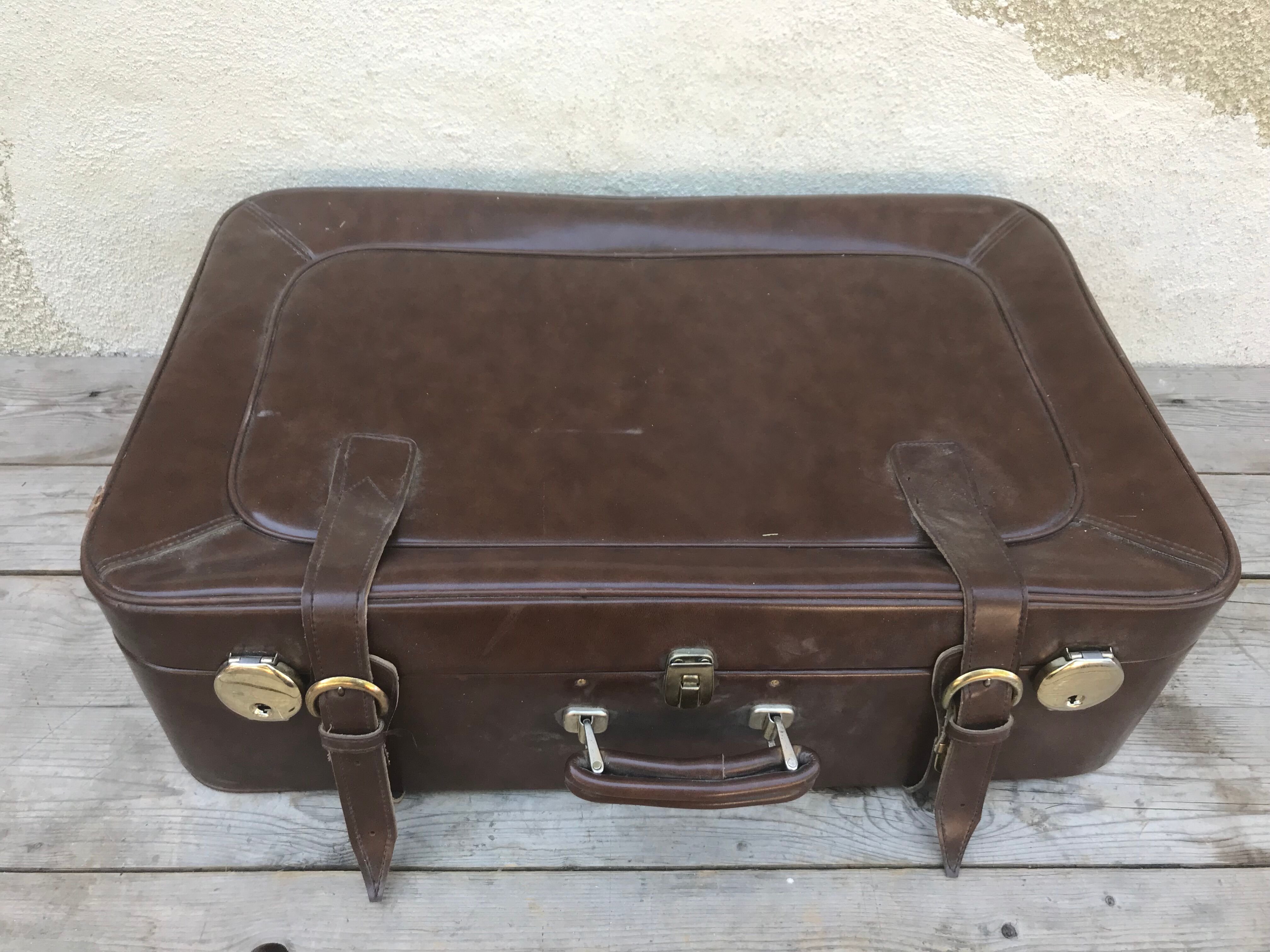 Old suitcase travel leather brown