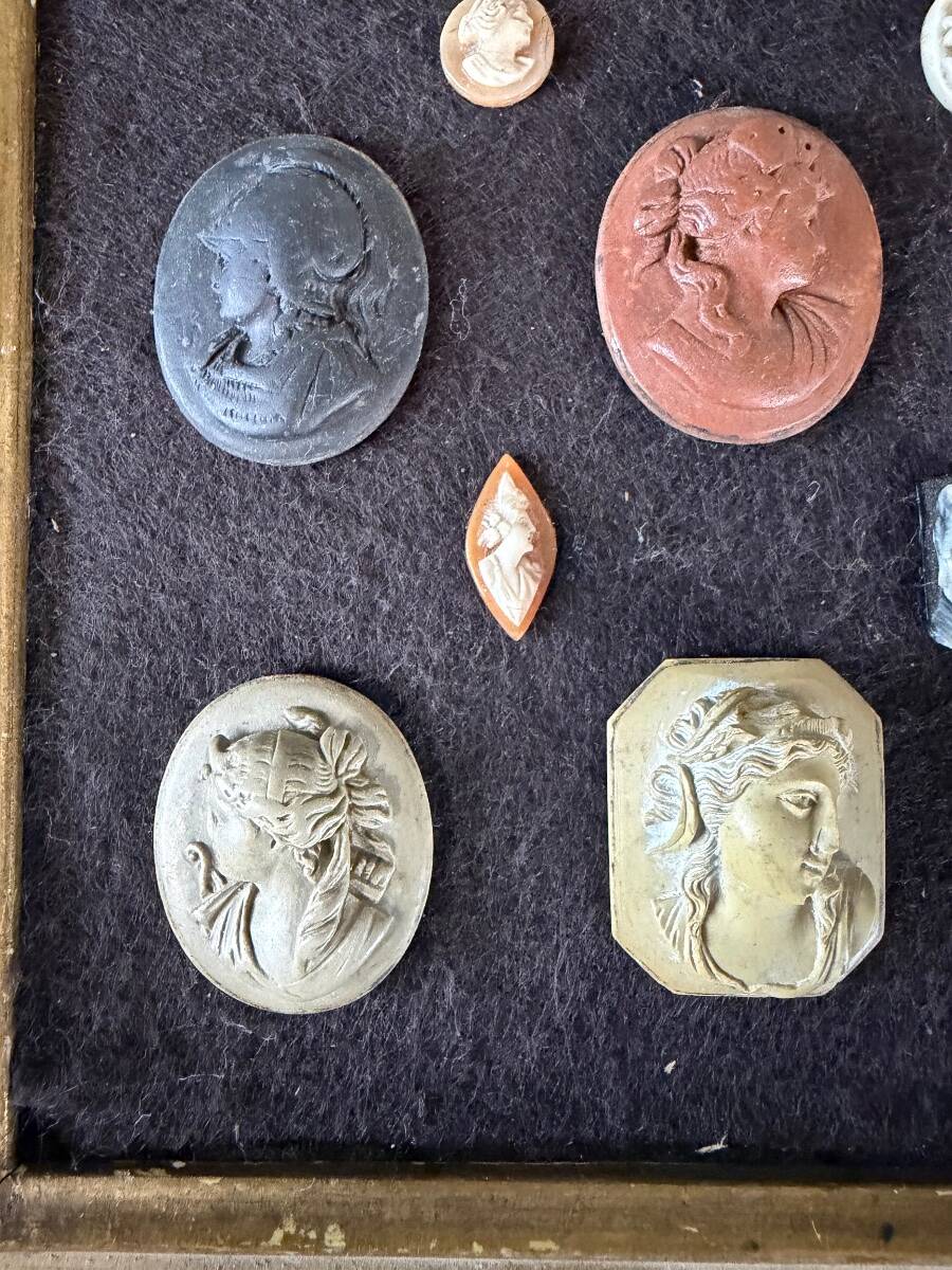 Collection of cameos and intaglios, shells and lava stones, around 1900.