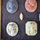 Collection of cameos and intaglios, shells and lava stones, around 1900.