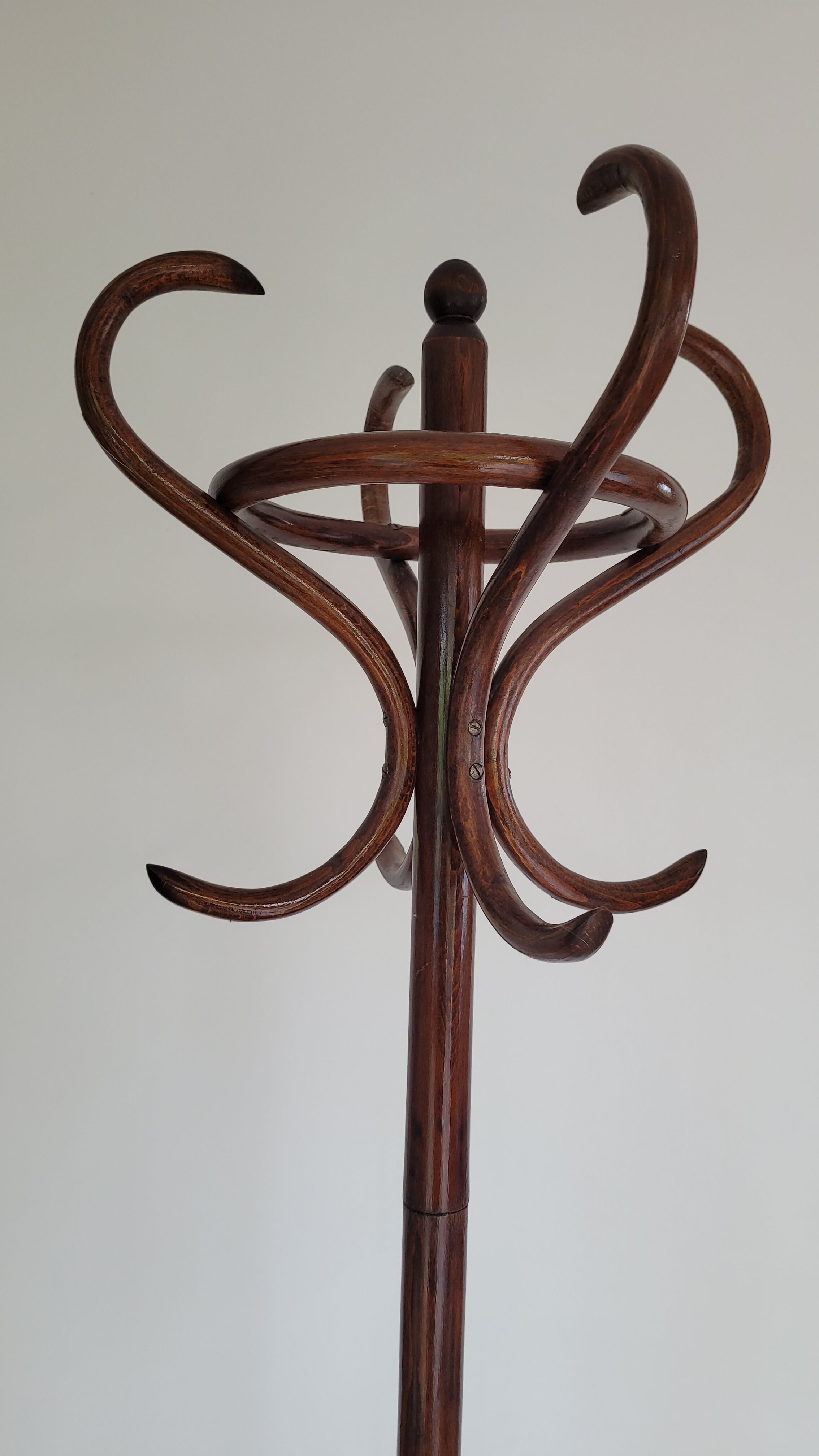 Wooden parrot coat rack on foot